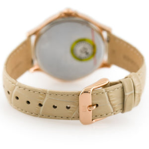 Tommy Hilfiger Amelia P4-1781710 damklocka med cremefärgat silikonarmband och roséguldfärgad boett, visad framifrån.