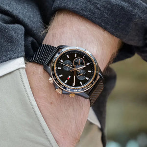 Tommy Hilfiger Miles 1792020 herrklocka med svart stålarmband och svart boett, visad framifrån.