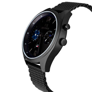 Tommy Hilfiger Deacon 1791547 herrklocka med svart stålarmband och svart boett, visad framifrån.