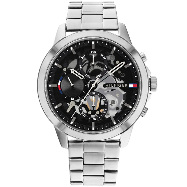 Tommy Hilfiger Henry 1710477 herrklocka med silverfärgat stålarmband och svart urtavla, visad framifrån.