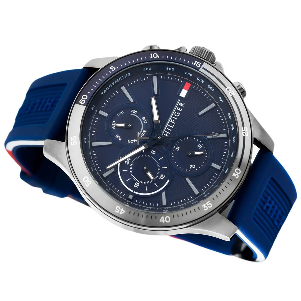 Tommy Hilfiger Bank 1791721 herrklocka med blått silikonarmband och grå boett, visad framifrån.
