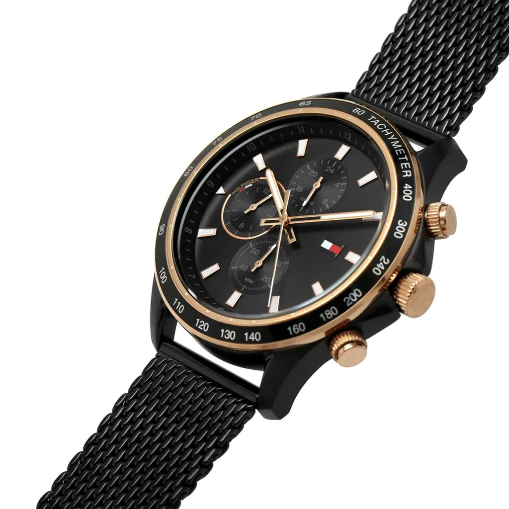 Tommy Hilfiger Miles 1792020 herrklocka med svart stålarmband och svart boett, visad framifrån.