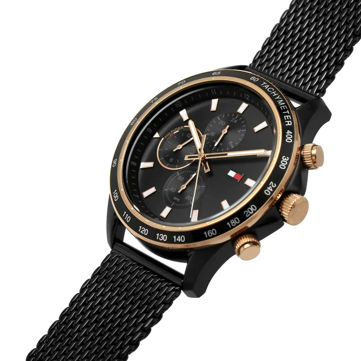 Tommy Hilfiger Miles 1792020 herrklocka med svart stålarmband och svart boett, visad framifrån.