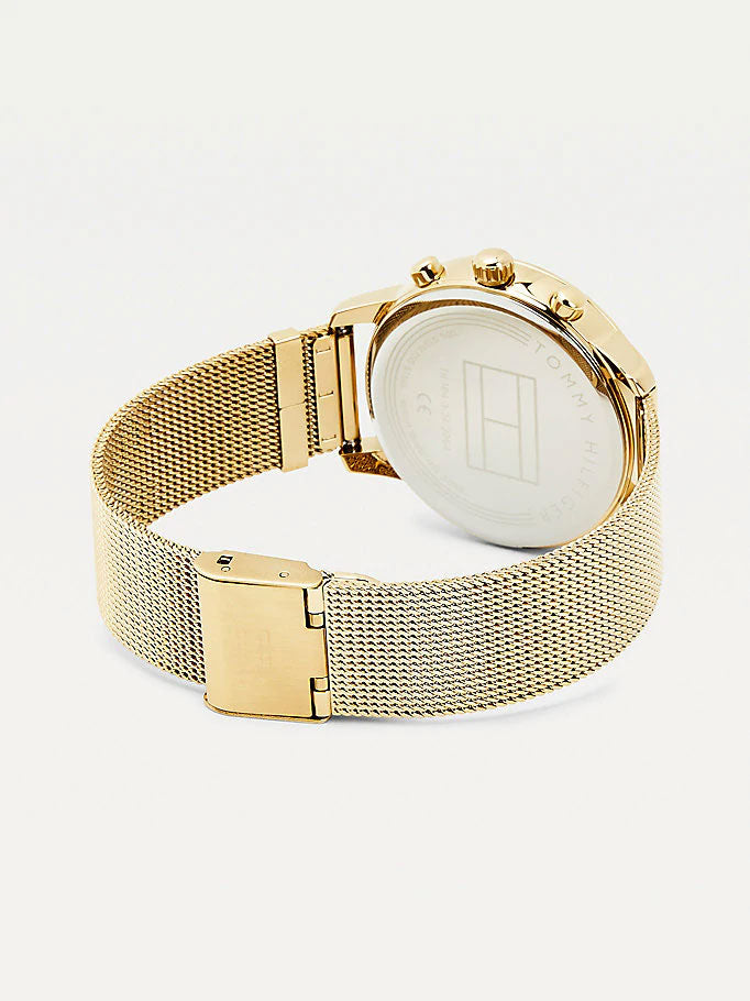 Tommy Hilfiger Blake 1782302 damklocka med guldfärgat stålarmband och guldfärgad boett, visad framifrån.